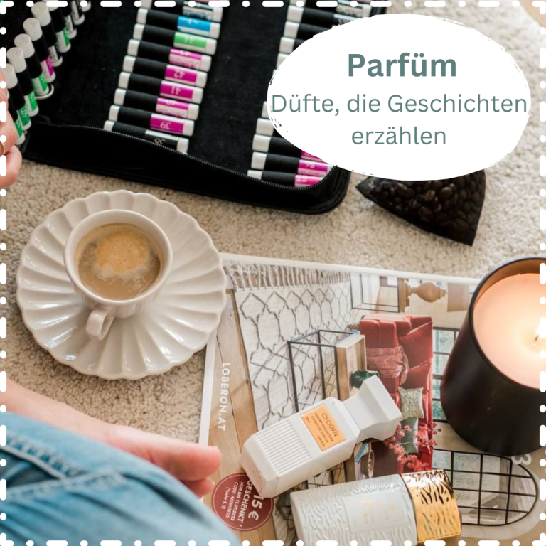 Duftkoffer ausleihen Kaffeetasse, Parfümflaschen und Kerze auf einem Tisch, umgeben von Papieren.